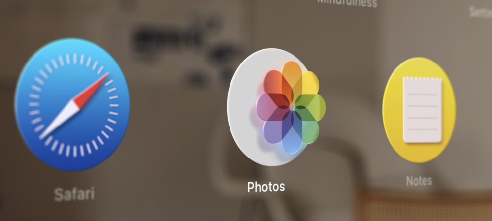 A zoom in photo of the Photos app in visionOS.  Where the colorful rainbow elements are elevated from the background.