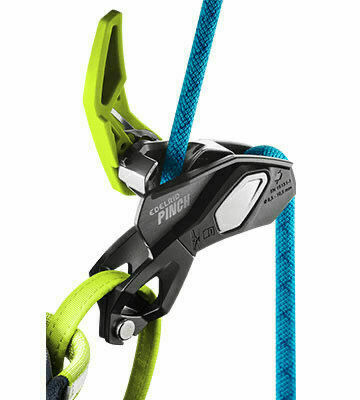 A belay device with ropes is clipped to a carabiner, typically used in rock climbing for safety and rope management.