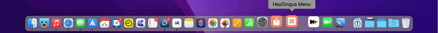 A dock filled with icons and HeyDingus Menu icon highlighted.