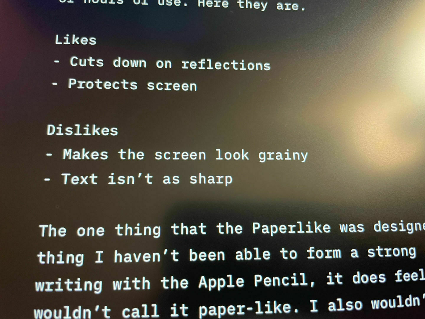 A close up shot of the blurry text on the screen.