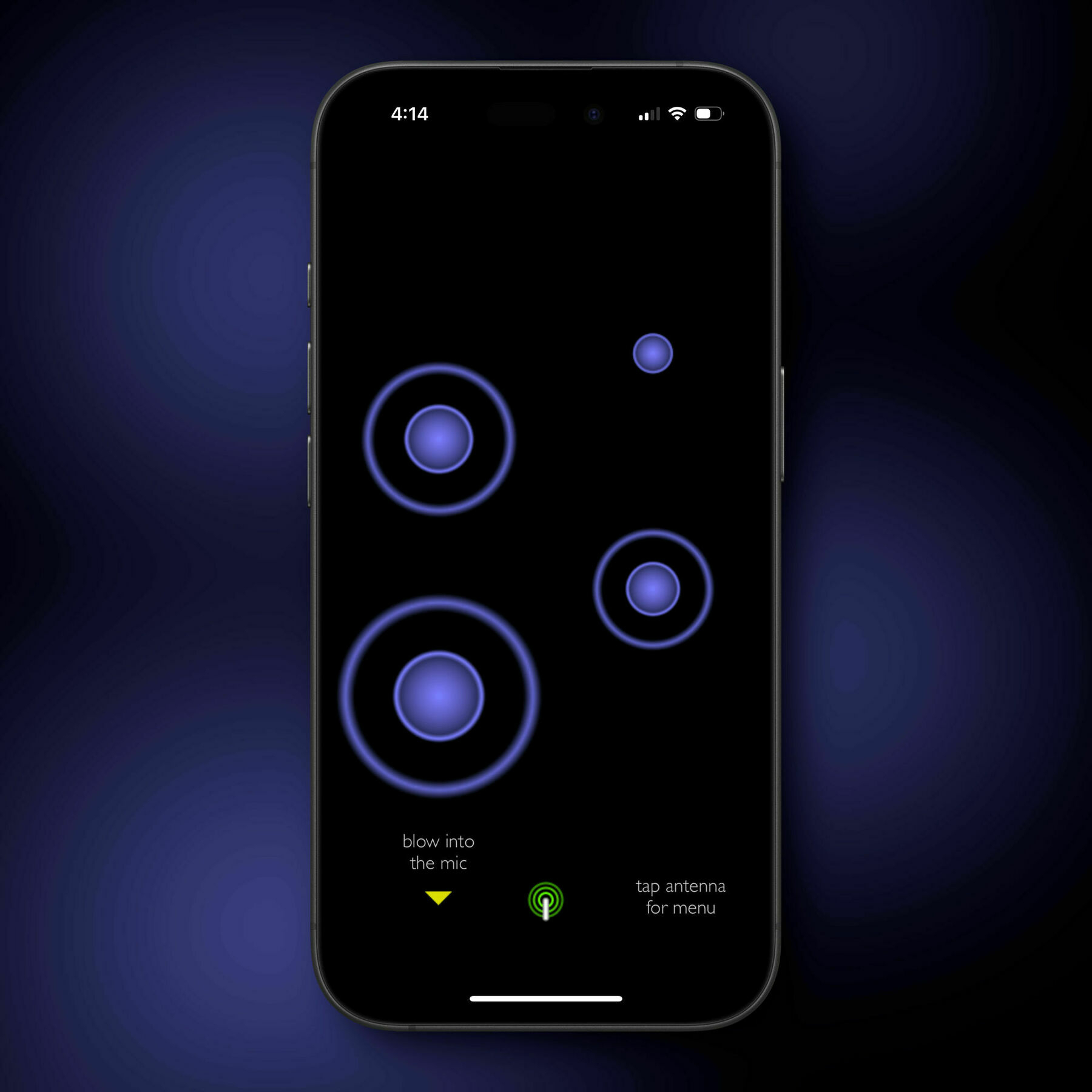 A smartphone screen displays pulsing blue circles against a black background. Text at the bottom reads: “blow into the mic” and “tap antenna for menu.”